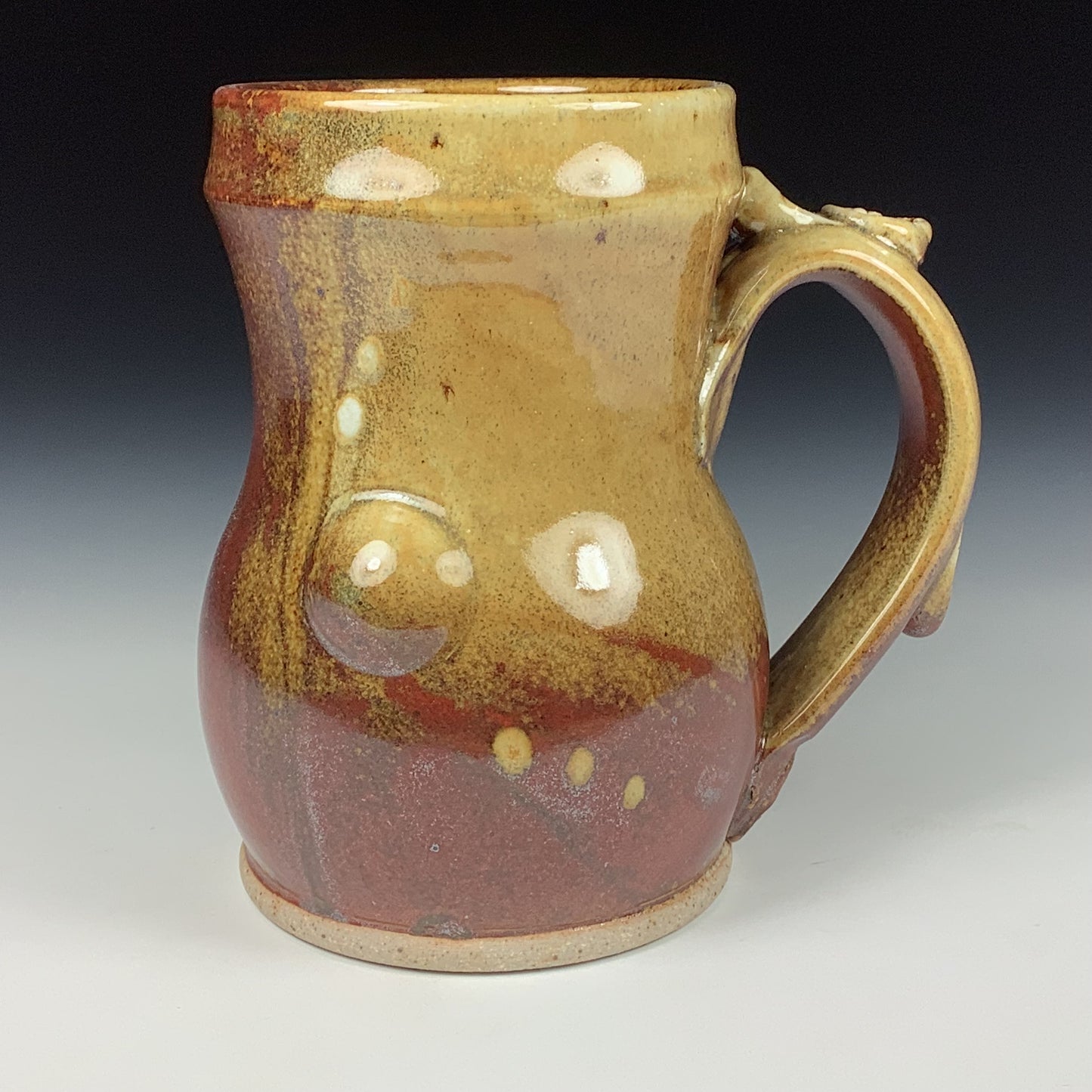 Handmade Stoneware Coffee Mug: Iron Red with White Ash Glaze, Bamboo Slip-Trailed Bump Pottery Tea Mug - item 3641