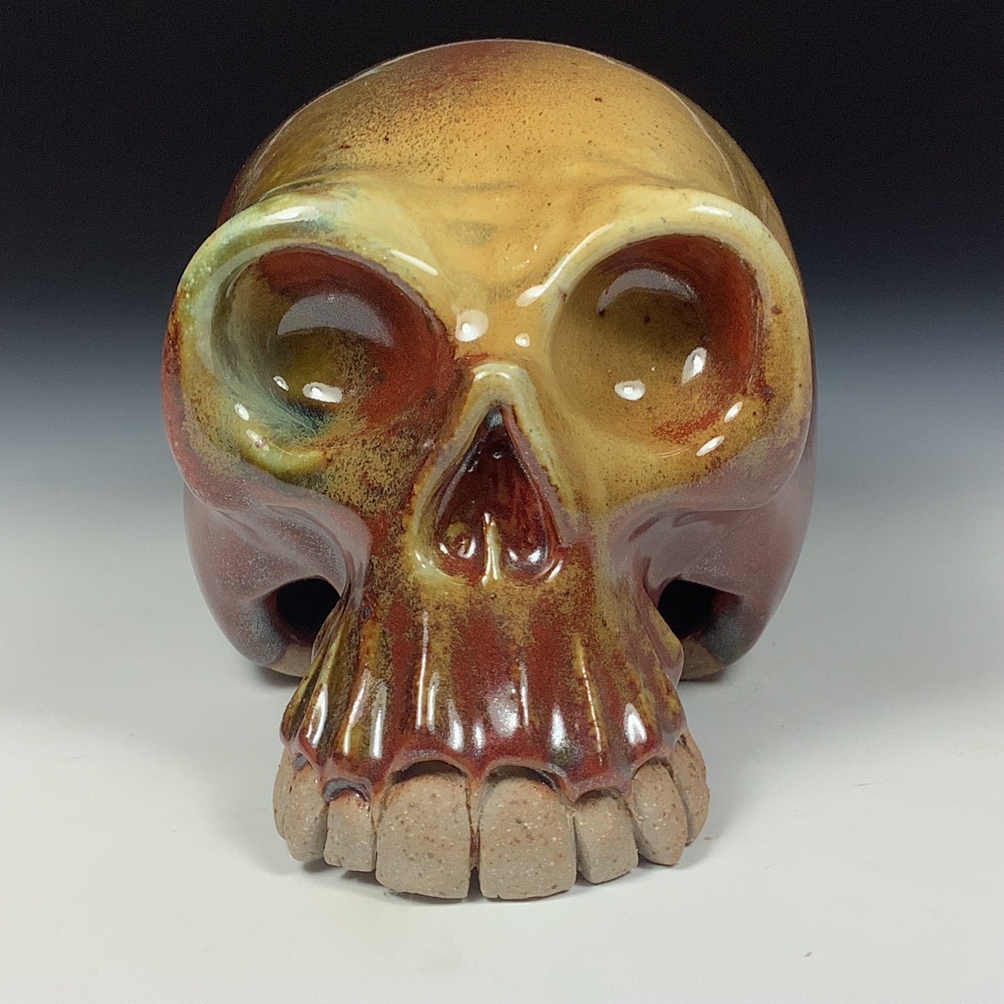 Handmade stoneware art abstract ceramic sculptures pottery decoration skull - Iron red with white ash wheel thrown enclosed form altered skull sculpture - item 3826