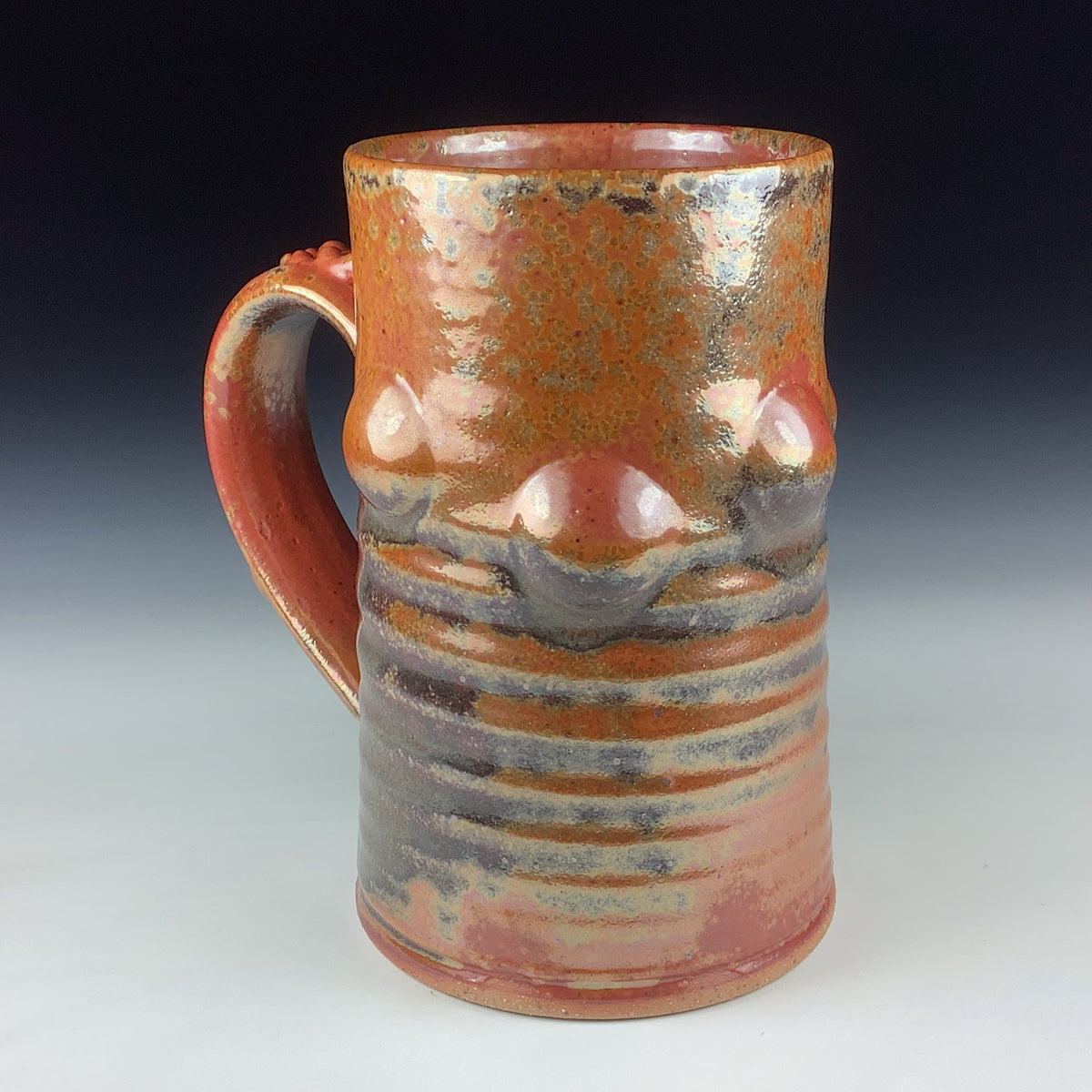 Handmade Stoneware Coffee Mug: Shino Orange Glaze, Bump Pottery Tea Mug