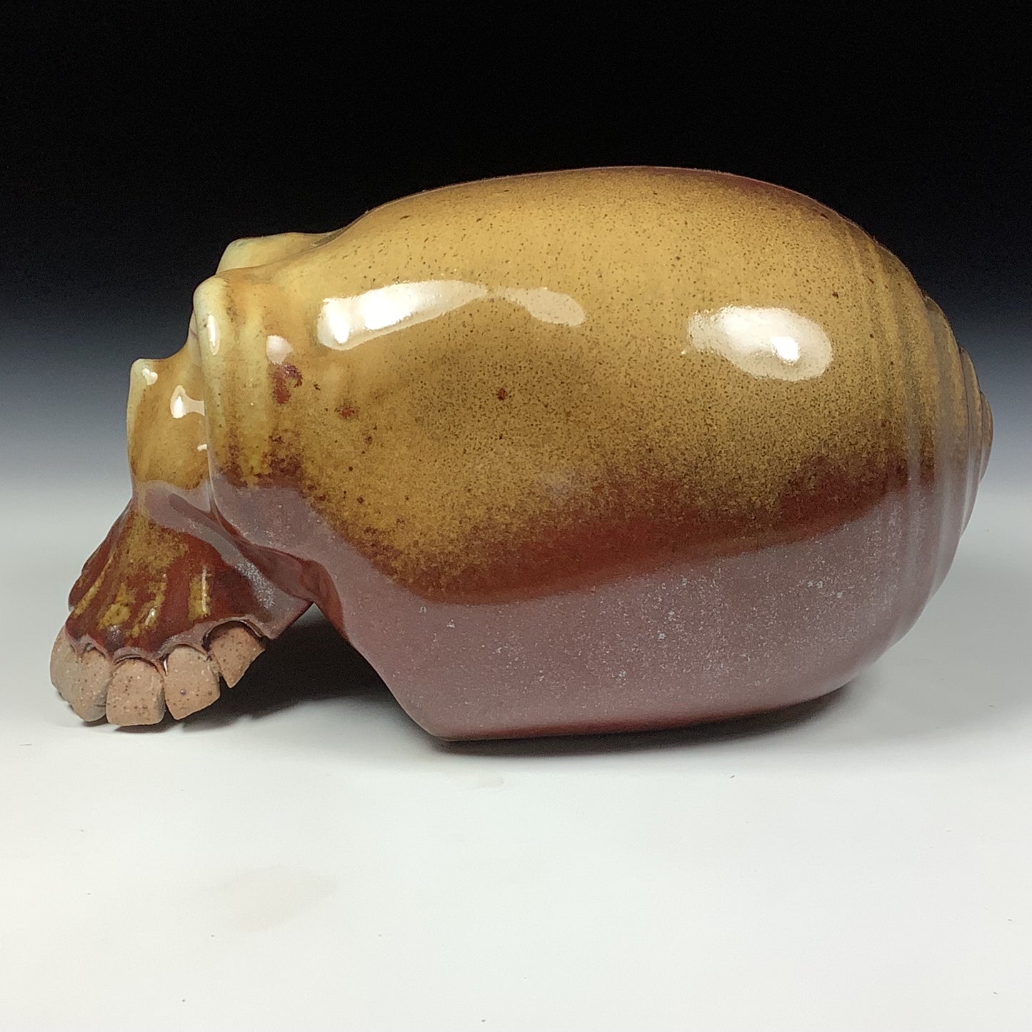 Handmade stoneware art abstract ceramic sculptures pottery decoration skull - Iron red with white ash wheel thrown enclosed form altered skull sculpture - item 3826