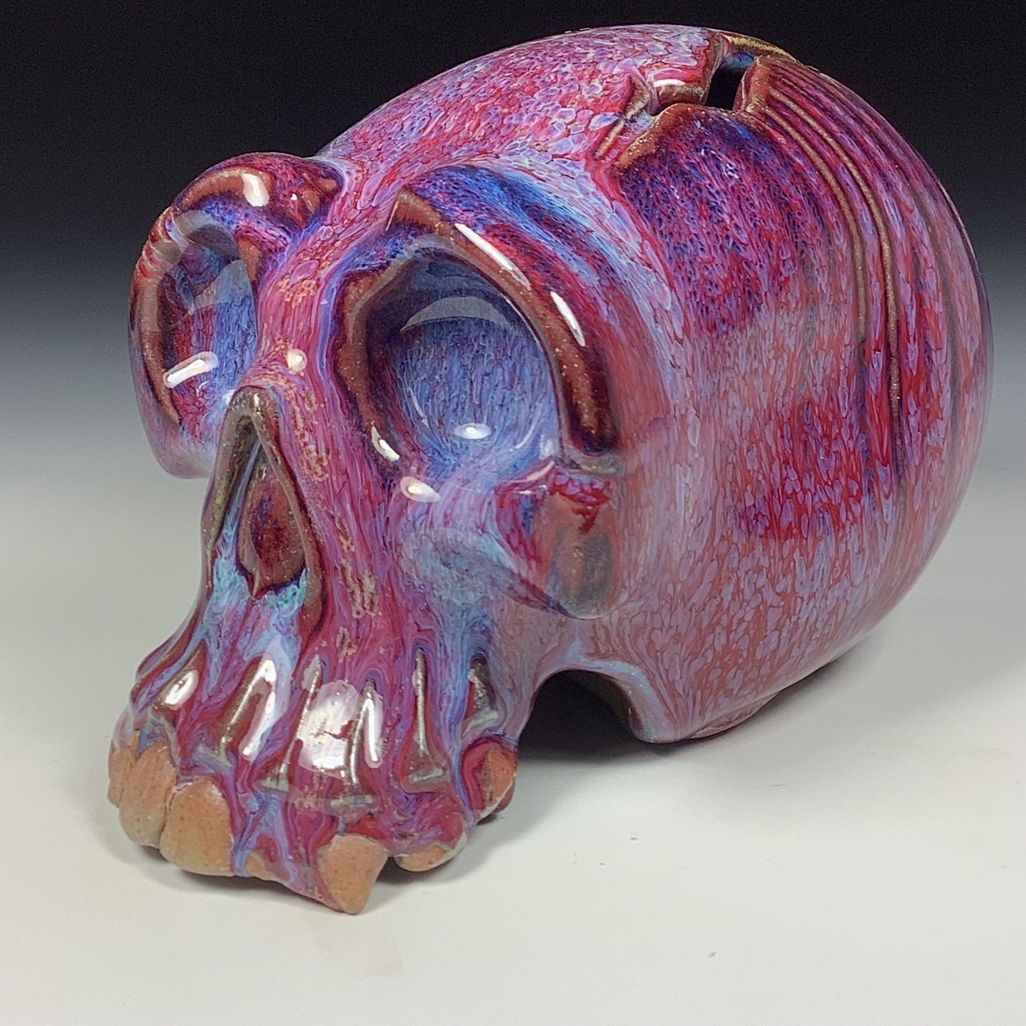 Handmade stoneware art abstract ceramic sculptures pottery decoration skull - Purple red wheel thrown enclosed form altered skull sculpture - item 3827