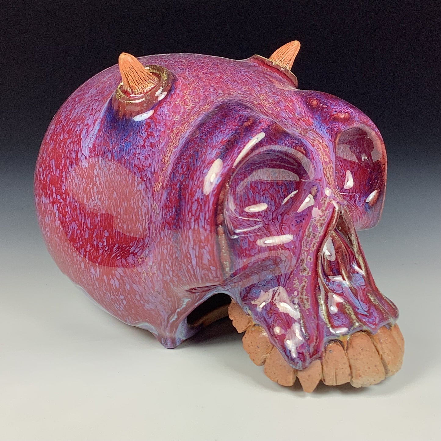 Handmade stoneware art abstract ceramic sculptures pottery decoration skull - Red wheel thrown enclosed form altered skull sculpture - item 3879