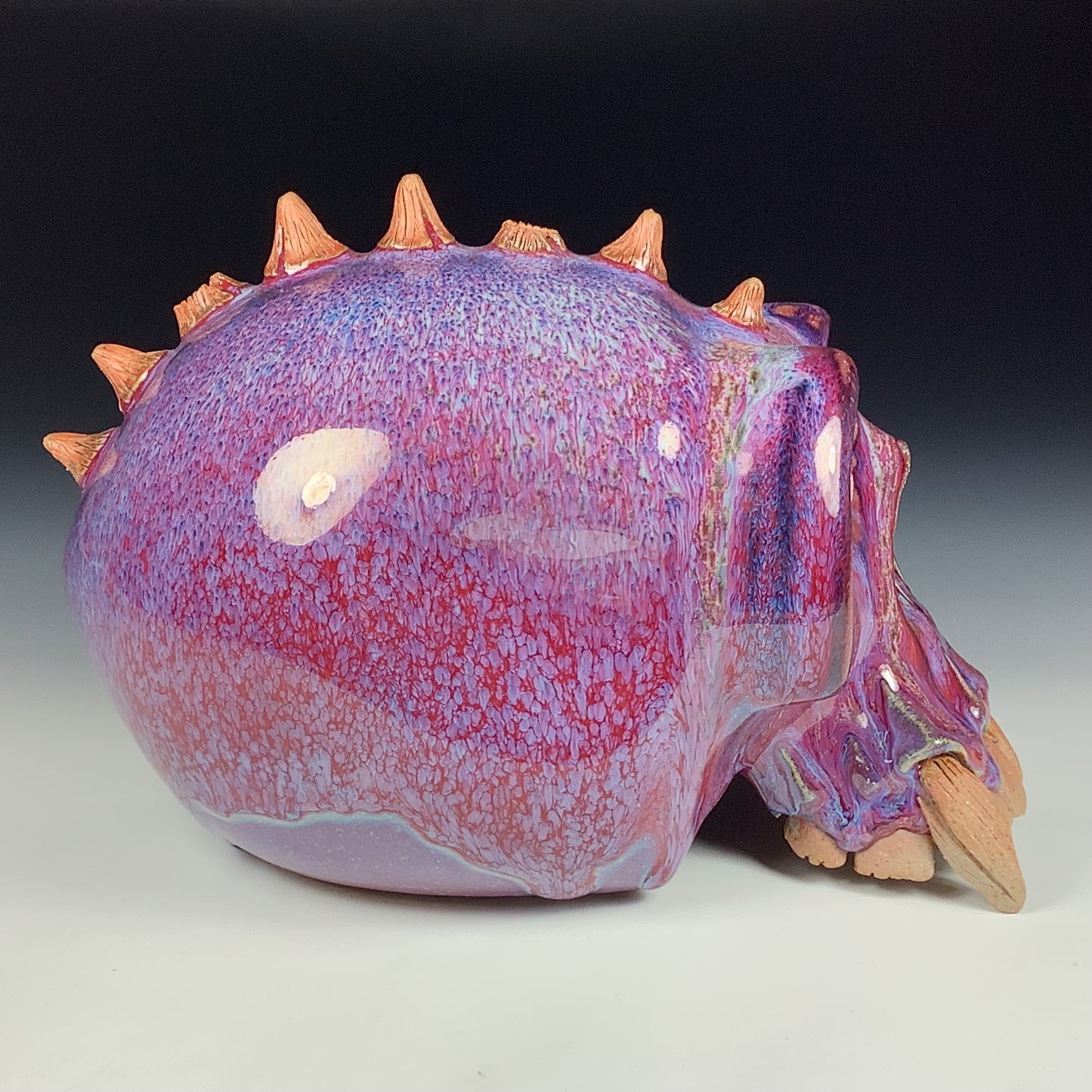 Handmade stoneware art abstract ceramic sculptures pottery decoration skull - Purple red wheel thrown enclosed form altered skull sculpture - item 3878