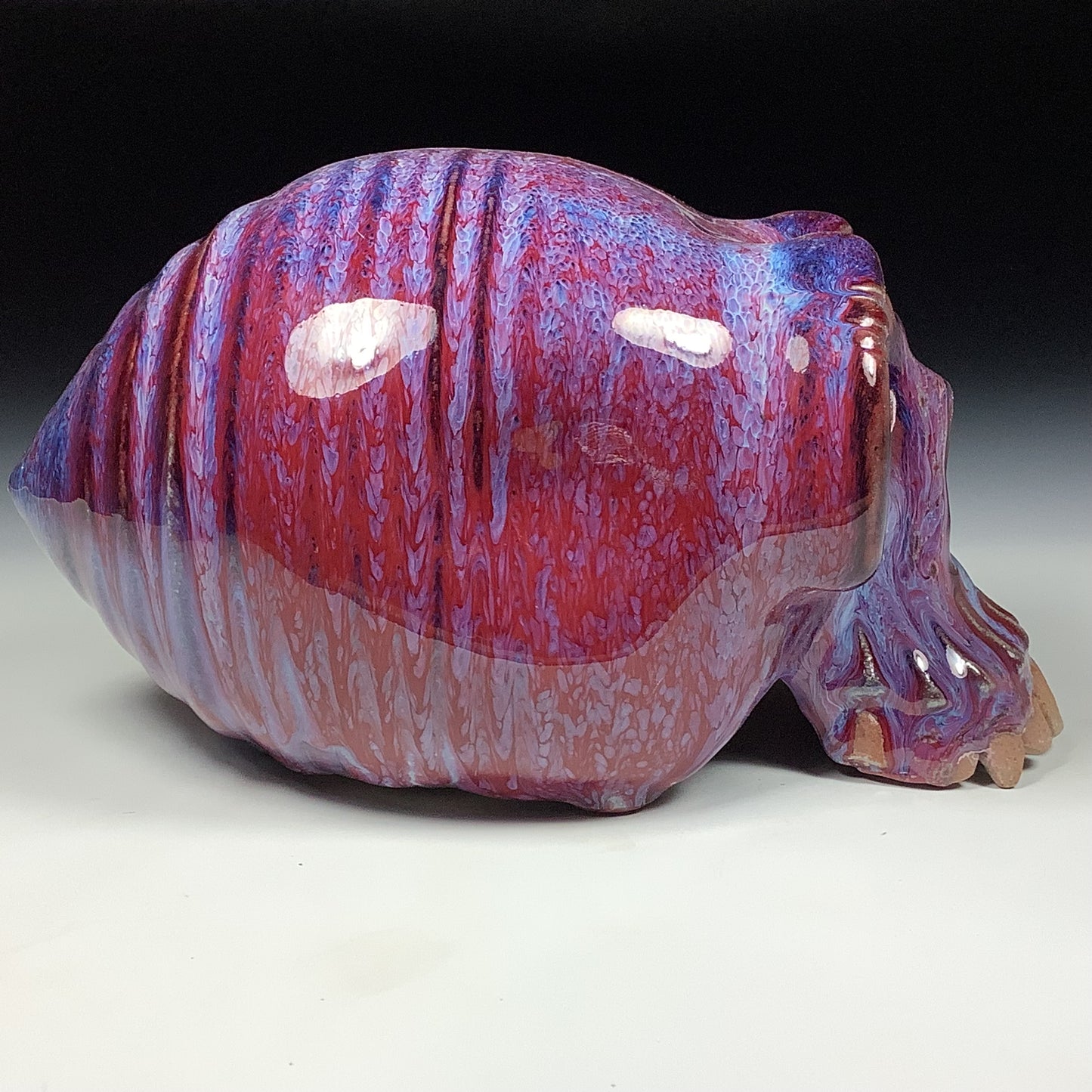 Handmade stoneware art abstract ceramic sculptures pottery decoration skull - Purple red wheel thrown enclosed form altered skull sculpture - item 3827