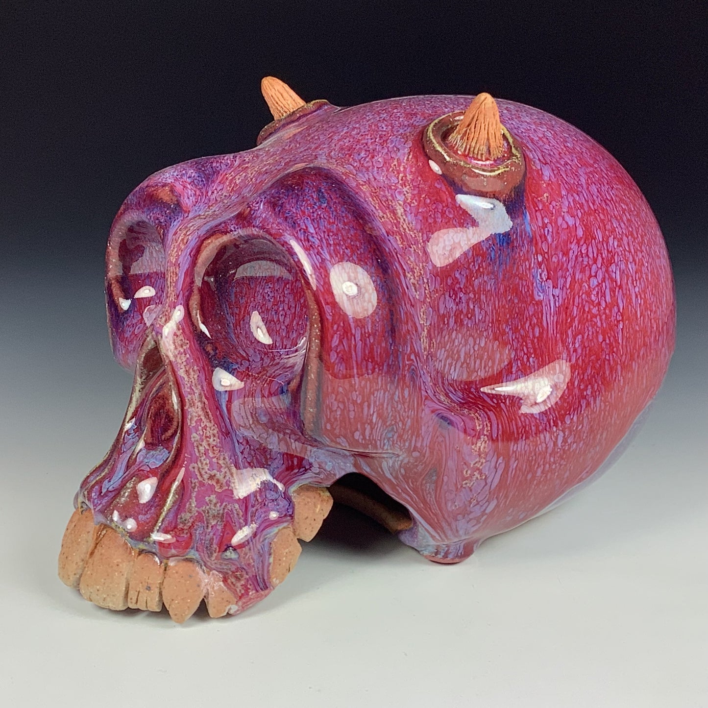 Handmade stoneware art abstract ceramic sculptures pottery decoration skull - Red wheel thrown enclosed form altered skull sculpture - item 3879