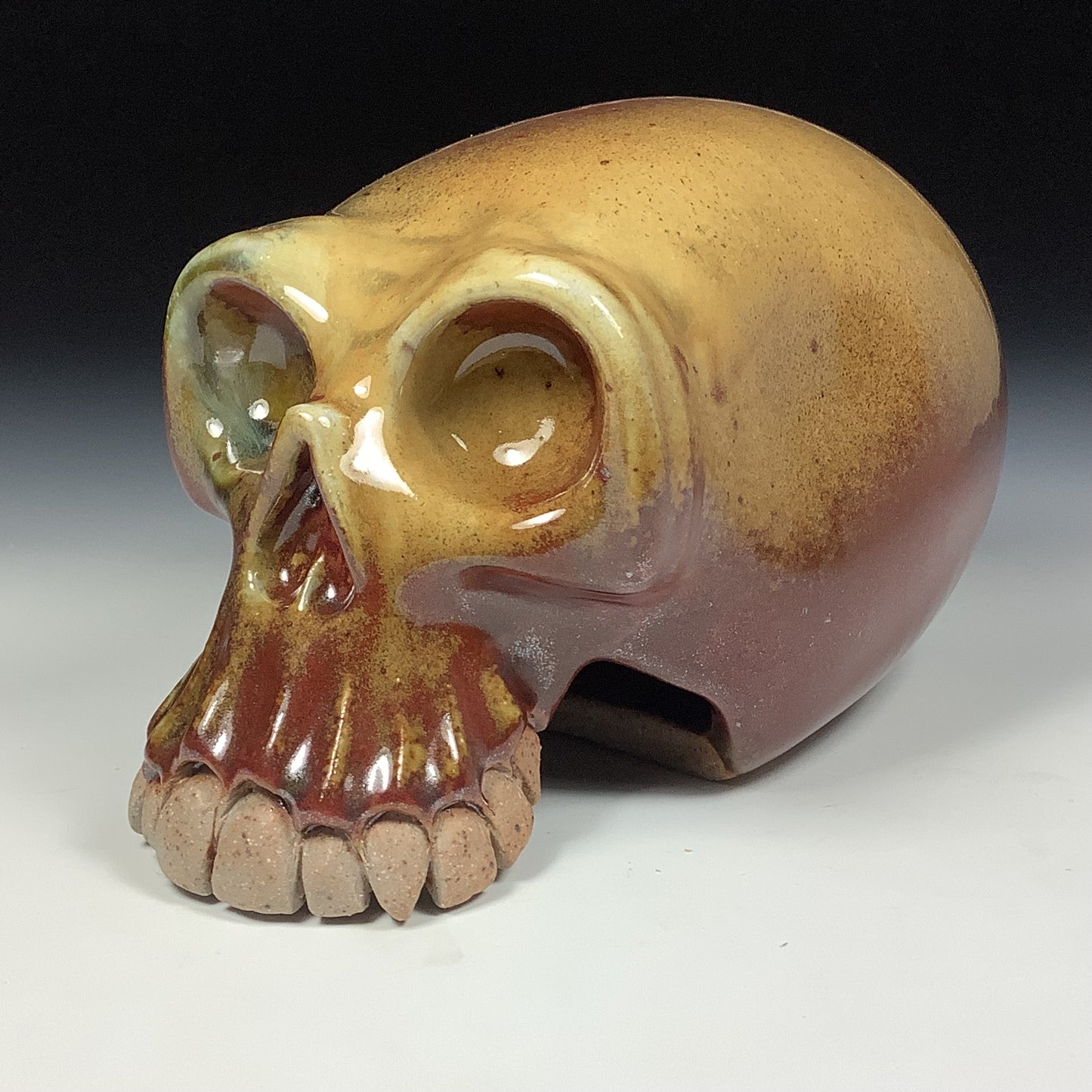 Handmade stoneware art abstract ceramic sculptures pottery decoration skull - Iron red with white ash wheel thrown enclosed form altered skull sculpture - item 3826