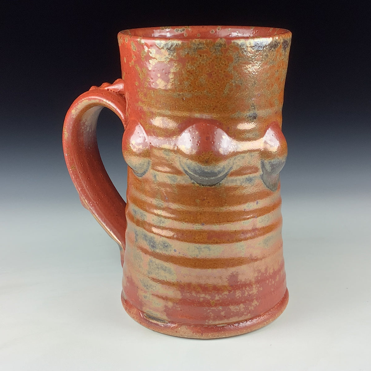 Handmade Stoneware Coffee Mug: Shino Orange Glaze, Bump Pottery Tea Mug