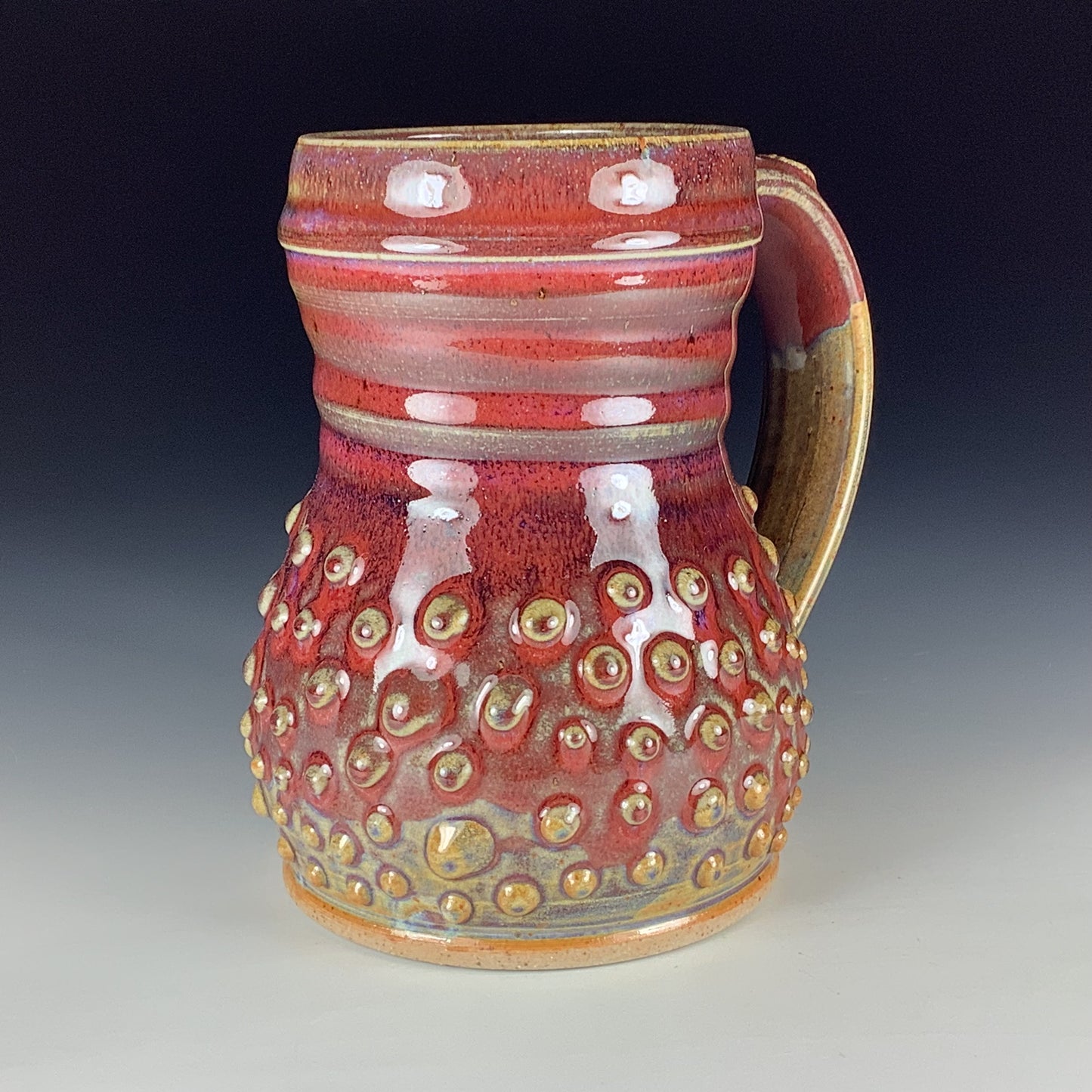 Handmade Stoneware Coffee Mug: Red Glaze, Slip-Dotted