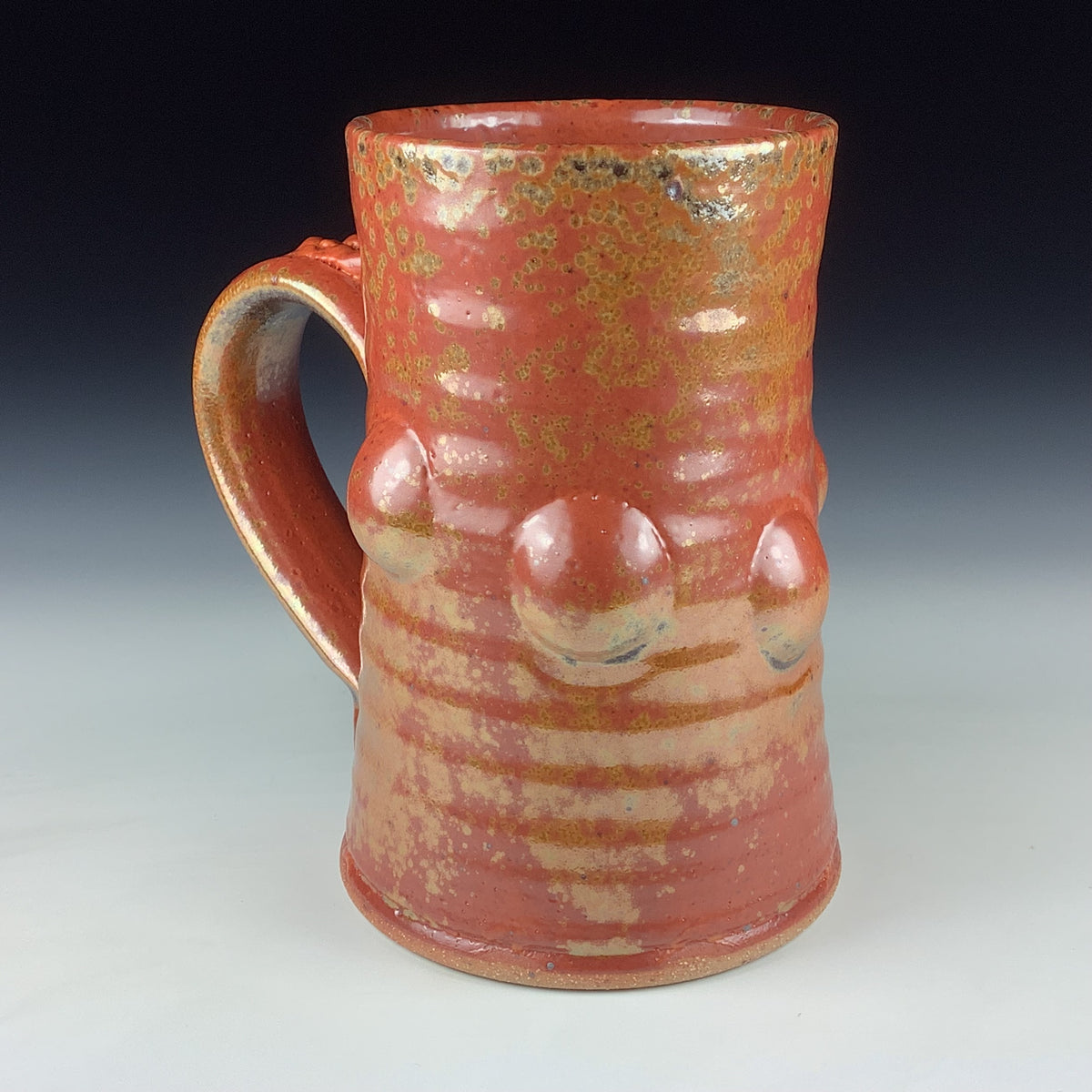 Handmade Stoneware Coffee Mug: Shino Orange Glaze, Bump Pottery Tea Mug