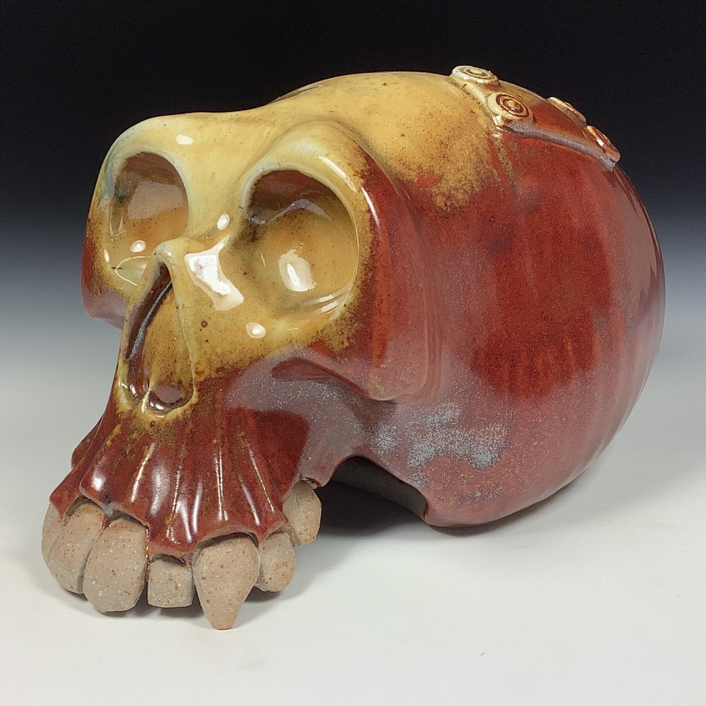 Handmade stoneware art abstract ceramic sculptures pottery decoration skull - Iron red with white ash wheel thrown enclosed form altered skull sculpture - item 3828