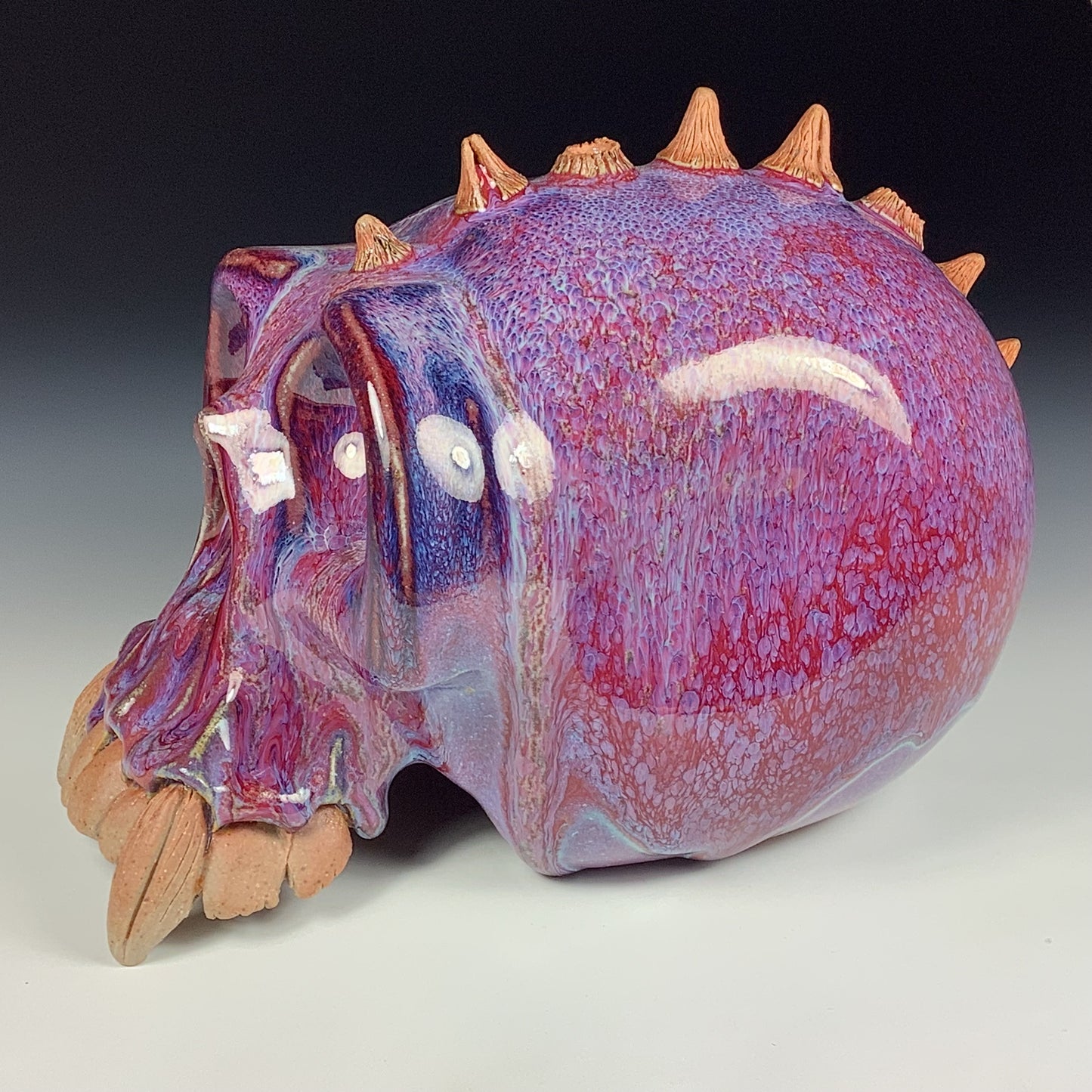 Handmade stoneware art abstract ceramic sculptures pottery decoration skull - Purple red wheel thrown enclosed form altered skull sculpture - item 3878