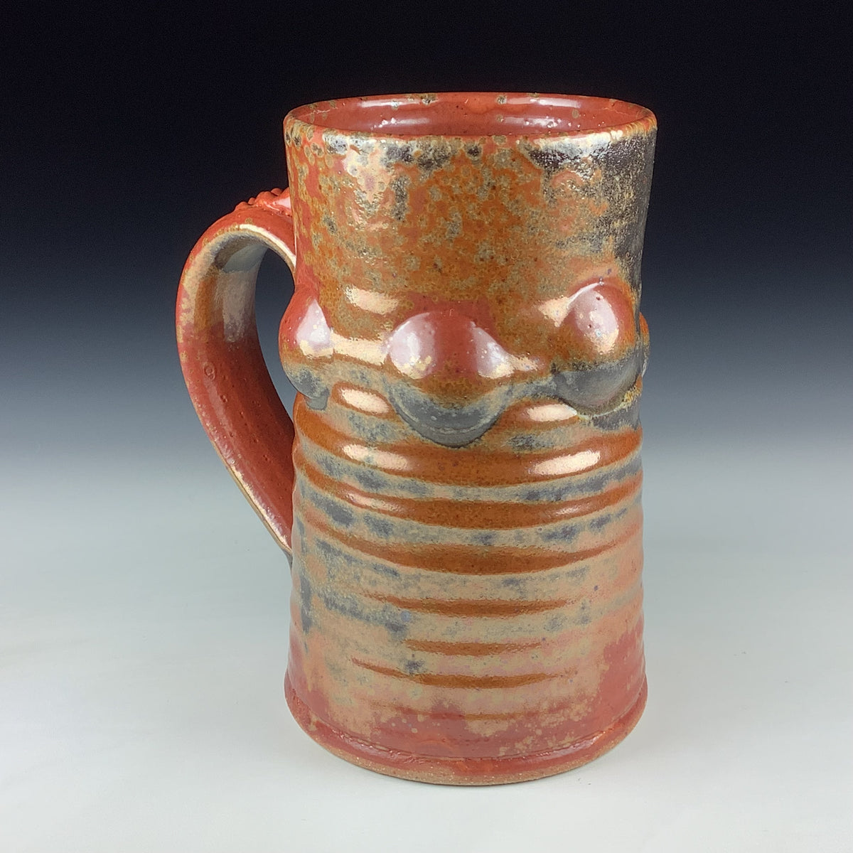 Handmade Stoneware Coffee Mug: Shino Orange Glaze, Bump Pottery Tea Mug