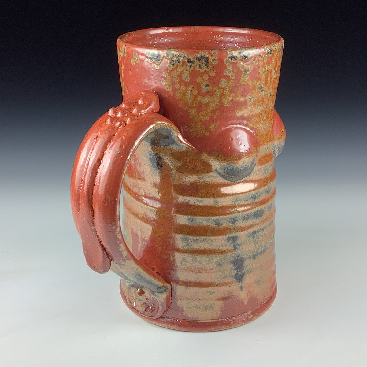 Handmade Stoneware Coffee Mug: Shino Orange Glaze, Bump Pottery Tea Mug