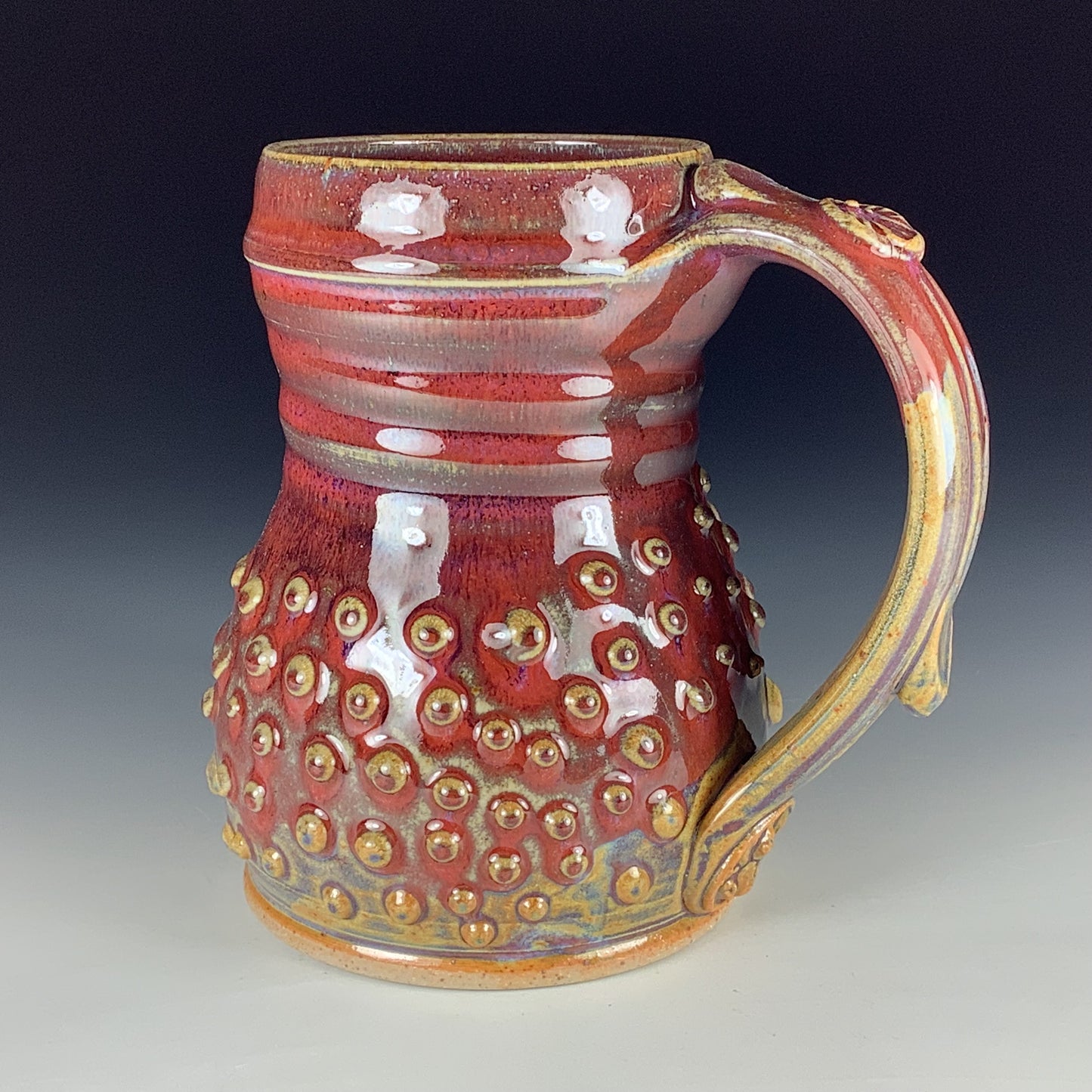 Handmade Stoneware Coffee Mug: Red Glaze, Slip-Dotted
