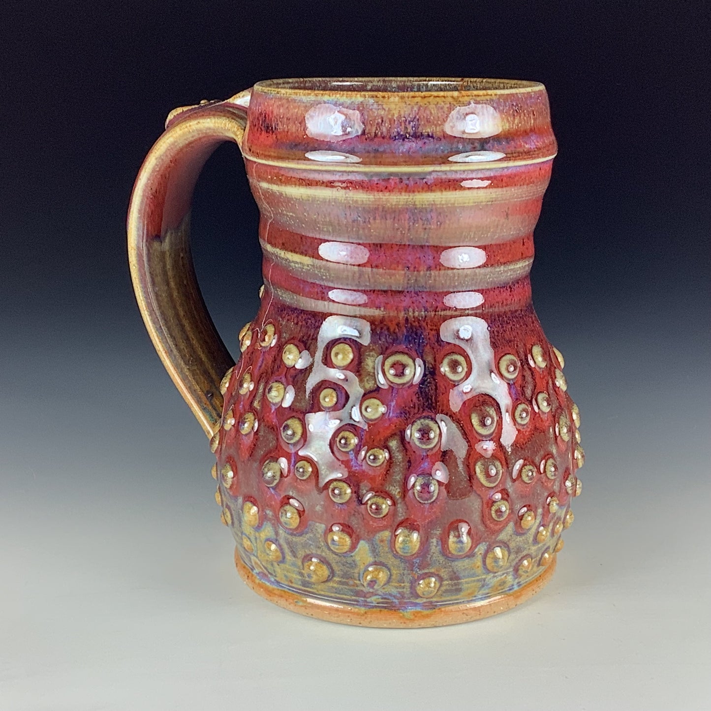 Handmade Stoneware Coffee Mug: Red Glaze, Slip-Dotted