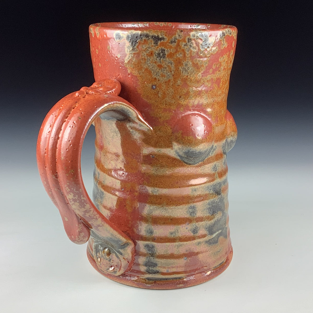 Handmade Stoneware Coffee Mug: Shino Orange Glaze, Bump Pottery Tea Mug