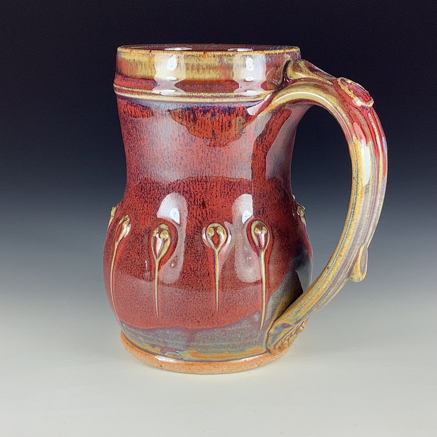 Handmade Stoneware Coffee Mug: Red Glaze, Slip-Dotted