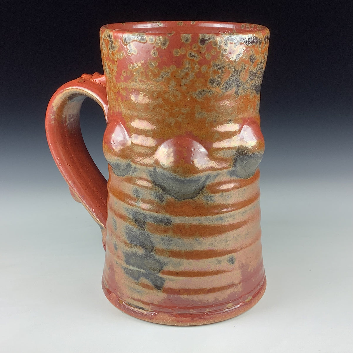 Handmade Stoneware Coffee Mug: Shino Orange Glaze, Bump Pottery Tea Mug