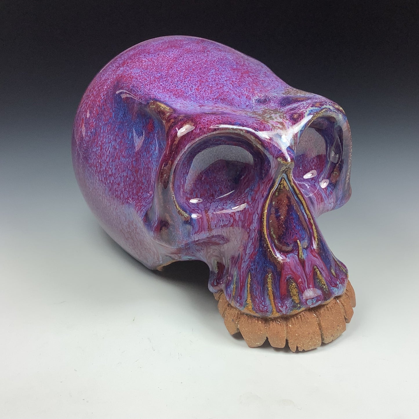 Handmade stoneware art abstract ceramic sculptures pottery decoration skull - Purple wheel thrown enclosed form altered skull sculpture - item 3587