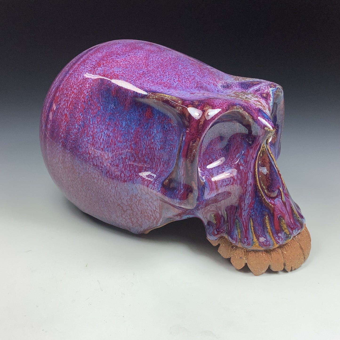 Handmade stoneware art abstract ceramic sculptures pottery decoration skull - Purple wheel thrown enclosed form altered skull sculpture - item 3587